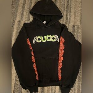 CUCO Black Hoodie with Red Floral Design